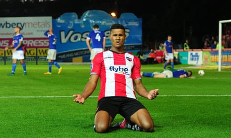 Ollie Watkins celebrates scoring for Exeter against Carlisle in the League Two playoff semi-final in 2017.
