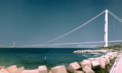 A white suspension bridge over water