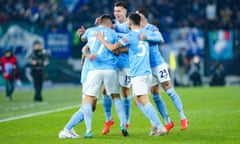 Lazio players celebrate a goal against Milan