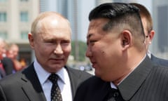 Russian President Vladimir Putin, left, and North Korea's leader Kim Jong Un attend the official welcome ceremony in the Kim Il Sung Square in Pyongyang, North Korea, on Wednesday, June 19, 2024. (Gavriil Grigorov, Sputnik, Kremlin Pool Photo via AP)