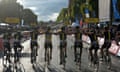 Christopher Froome wearing the overall leader's yellow jersey, arrives with his teammates of the Great Britain's Sky cycling team to cross the finish line on the Champs-Elysees