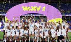 England celebrate with the trophy after victory in the WXV1 match against New Zealand in Auckland