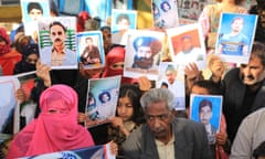 In the middle, wearing grey coat, Mama Qadeer, who led the on foot long march from Quetta to islamabad in late 2013-14 is in missing persons camp. a pioneer of the camp