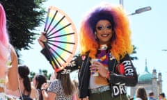 People attend the Brighton Pride festival in Sussex