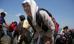 An elderly woman after disembarking a dinghy with other migrants on the island of Lesbos, Greece in August.