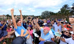 BESTPIX- Els for Autism pro-am<br>PALM BEACH GARDENS, FL - MARCH 07:  Rickie Fowler of the United States is held aloft by Ernie Els after he had just holed in one in the $1 million Hole-In-One Challenge sponsored by SAP and Ketel One Vodka for the Els for Autism Foundation's Center of Excellence in Jupiter, Florida during the Els for Autism Pro-am at the Old Palm Golf Club on March 7, 2016 in Palm Beach Gardens, Florida.  (Photo by David Cannon/Getty Images) *** BESTPIX ***