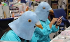 people dressed up with Twitter bird heads