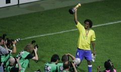 FIFA Confederations Cup 2005 Final Brazil v Argentina<br>FRANKFURT, GERMANY - JUNE 29:  Roque Junior of Brazil celebrates with the trophy following the FIFA 2005 Confederations Cup Final between Brazil and Argentina at the Waldstadion June 29, 2005, in Frankfurt, Germany.  (Photo by Lars Baron/Bongarts/Getty Images)