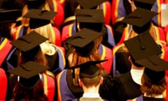 A a graduation ceremony showing students in a university hall.