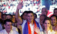 Santiago Peña celebrates next to his wife, Leticia Ocampos, at the Colorado party headquarters after winning Paraguay's presidential election.