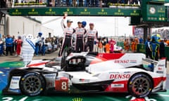 From left Toyota’s Kazuki Nakajima, Sebastien Buemi and Fernando Alonso celebrate winning Le Mans 24 Hours.