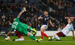 Scotland’s John McGinn scores their second goal.