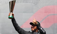 Lewis Hamilton celebrates on the podium at the Belgian Grand Prix