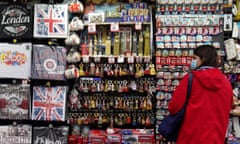 A tourist looks at souvenirs on sale in central London.