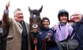 Paul Nicholls celebrates alongside Harry Cobden and Stage Star after winning the Turners Novices Chase during day three of the Cheltenham Festival