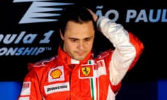 Felipe Massa of Ferrari reacts on the podium after Lewis Hamilton pipped him to the F1 drivers’ title in Brazil in 2008.