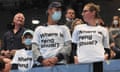 Spectators wearing T-shirts supporting Peng Shuai