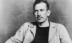 John Steinbeck in 1935, with a moustache, wearing a jacket over a T-shirt and looking serious