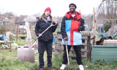 Flo Dill and Novelist holding spades on Dill's allotment