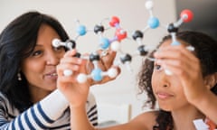mother and child looking at a molecular model