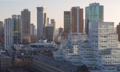 Sim City stack … The Timmerhuis by OMA rises on to Rotterdam’s skyline like a pixelated mountain.