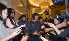 Malaysian LGBT rights activists talks to press outside court