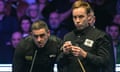 Ronnie O'Sullivan (left) and Ali Carter (right) at the Masters snooker tournament final on Sunday.