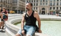 Stéphane sitting on the side of a fountain pool