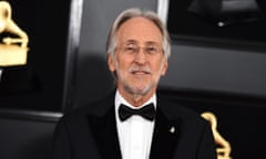 Middle-aged white man with long-ish white hair and beard in a tux.