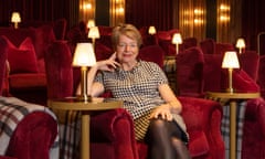 Woman in plush posh cinema