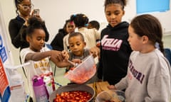 Kids are taught how to make strawberry jam by Shanelle Webb at The Soul Shack.