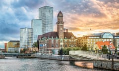 Beautiful cityscape with sunset over canal and skyline in Malmo, Sweden.