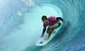 Australia's Jack Robinson rides a barrel in the second round of the men's Olympic surfing at Teahupo'o.