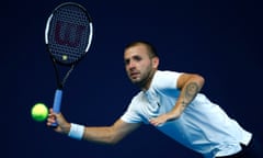 Dan Evans plays a forehand in the Battle of the Brits final against Kyle Edmund at the National Tennis Centre, Roehampton.