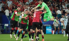 Players of Georgia celebrate their Euro 2024 victory against Portugal