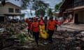 Hundreds of military personnel and volunteers have been scouring debris-strewn beaches in search of survivors after a tsunami struck the Sunda Strait