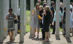 People lay flowers at the 7/7 memorial in London’s Hyde Park.