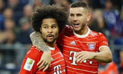 Serge Gnabry is embraced by Lucas Hernandez after opening the scoring against Schalke