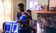 Rachel, 34, holds son at home in Cleveland Heights, Ohio.