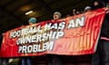 Reading fans watch their team at Wigan’s DW Stadium a week after forcing the abandonment of a home game in protest against owner Dai Yongge.