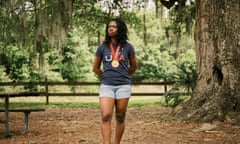 Erin Jackson, winner of the gold medal for women’s speed skating in the 2022 Winter Olympics, poses for a portrait at Baseline Trailhead Park in Ocala, Florida. Jackson, who grew up Ocala just minuted from this park, is the first Black woman to win a Winter Olympic gold medal in an individual sport. (Zack Wittman for The Guardian)