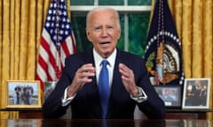 Older white man speaking at resolute desk