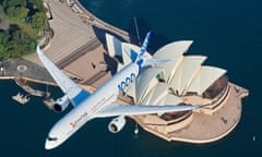 Qantas Announces Major Fleet Decision And confirms Order For A350-1000 Aircraft To Operate Project Sunrise flights<br>SYDNEY, AUSTRALIA - MAY 02: An Airbus A350-1000 flight test aircraft flies over the Sydney Opera House to mark a major fleet announcement by Australian airline Qantas on May 02, 2022 in Sydney, Australia. Twelve Airbus A350-1000's will be ordered to operate non-stop "Project Sunrise" flights from Australia's east coast to New York, London and other key destinations. The aircraft will feature market-leading passenger comfort in each travel class with services to start by the end of 2025. (Photo by James D. Morgan/Getty Images for Airbus/Qantas)