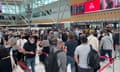 Travellers at the Sydney airport domestic terminal formed queues that spilled out of the building. 