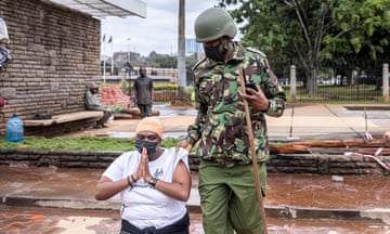 A woman is arrested during a protest against police brutality and harassment in Nairobi, Kenya.