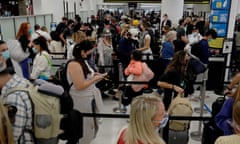 Thanksgiving Travel Returns To Near Pre-Pandemic Volumes Across U.S.<br>MIAMI, FLORIDA - NOVEMBER 24: People wait in the line to clear through the TSA checkpoint at Miami International Airport on November 24, 2021 in Miami, Florida. The Transportation Security Administration is expecting airline passenger numbers to reach pre-pandemic level the day before Thanksgiving, one of the busiest days at airports across the country. (Photo by Joe Raedle/Getty Images)