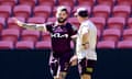 Coach Kevin Walters talks tactics with Adam Reynolds during a Brisbane Broncos training session before the NRL grand final.