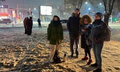 People gather in a street as they left apartment buildings after the earthquake was felt in Almaty, Kazakhstan