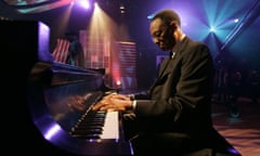 Jazz artist and show host Ramsey Lewis warms up before taping the Legends of Jazz with Ramsey Lewis show in 2005.