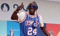 Flavor Flav has become a familiar figure behind the scenes for Team USA
